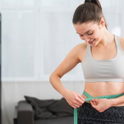 fitness-girl-measuring-herself-1024x683